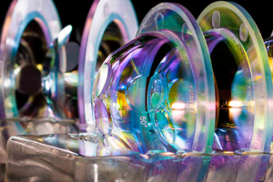 Laser optics with the coatings reflecting different coloured light.